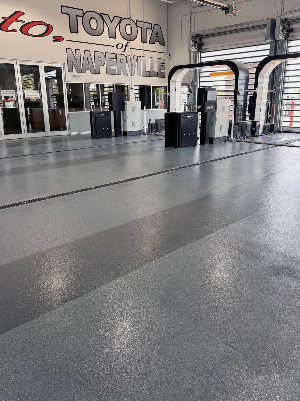 Coated car dealership floor