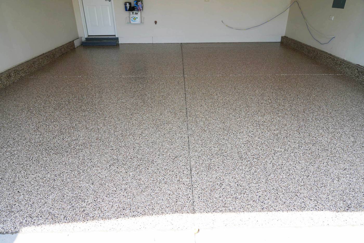 Tan and brown flake garage floor