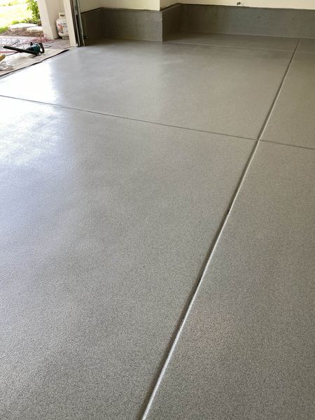 Gray flake garage floor detail